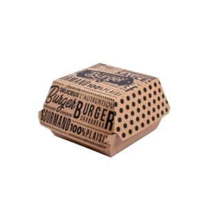 Burger savoureux emballé dans un papier kraft avec design noir à pois, mettant en avant la qualité et le plaisir de déguster un burger authentique, prêt à ravir les amateurs de restauration rapide.