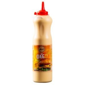 Sauce Cheezy pour burgers, idéale pour garnir sandwiches et hot-dogs, apportant une saveur fromagère crémeuse, disponible chez Bilad Food.